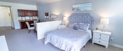 Cozy furnished bedroom in a senior living facility