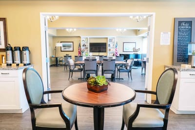 Interior common area with a table and chairs