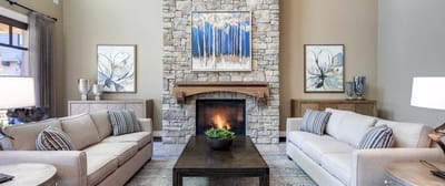 Inviting common area with cozy seating and fireplace