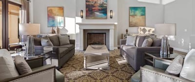 Cozy common area with sofas and artwork
