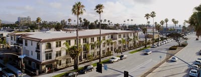 Aerial view of the facility with palm trees.