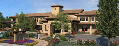 Exterior view of the facility with landscaped entrance.
