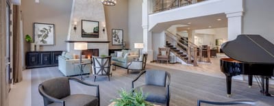 Elegant common area with seating and piano