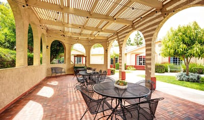 Outdoor patio with tables and chairs