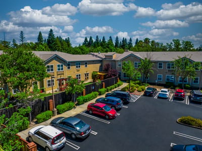 Aerial view of the facility's parking area and buildings.