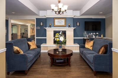 Comfortable seating area with floral decoration