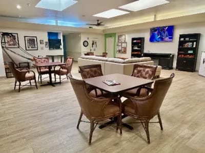 Common area with seating and a television.