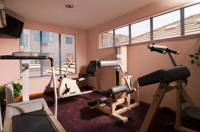 Interior view of a fitness area with exercise equipment.