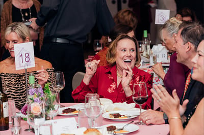 Residents enjoying a festive dinner celebration.