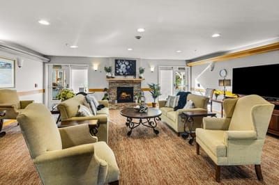 Common area with seating and a fireplace.