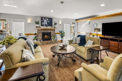 Cozy common area with seating and fireplace