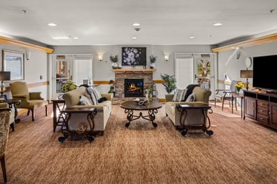 Comfortable common area with seating and fireplace.