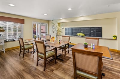 Bright common area with seating and mailboxes