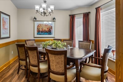 Dining area with a large table and chairs