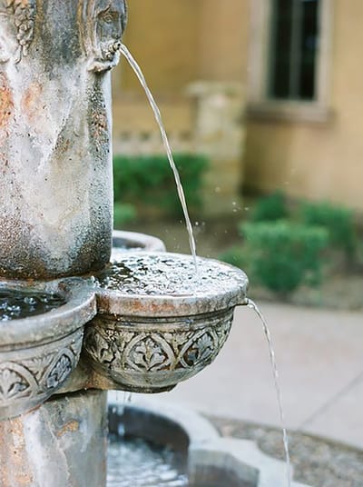 Decorative outdoor fountain with flowing water