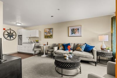 Cozy living area with comfortable seating and kitchenette