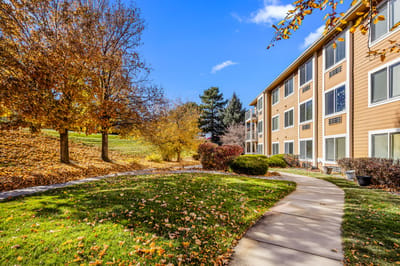 Scenic view of the facility's exterior with autumn foliage.