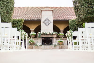 Serene outdoor space with chairs and floral decor