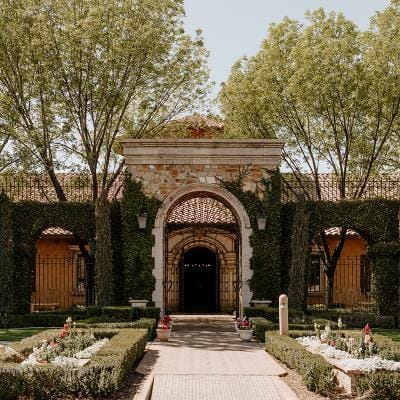 Entrance to Villa Siena surrounded by greenery.