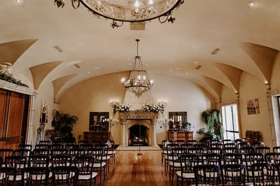 Elegant indoor space with chairs for an event.