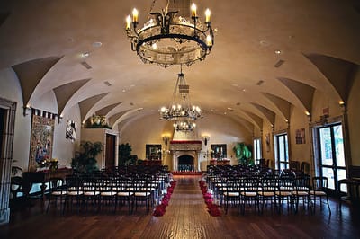 Elegant interior setting with chairs and chandeliers