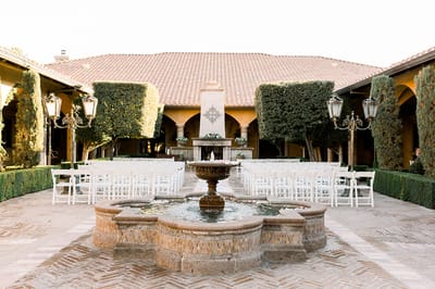 Outdoor courtyard with fountain and seating