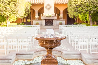 Outdoor event area with a fountain and seating