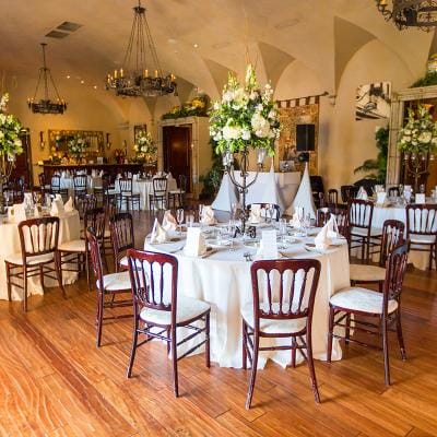 Elegant dining room set for a meal.