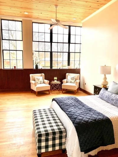 Well-decorated resident room with natural light.