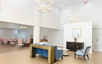Spacious and well-lit common area with seating