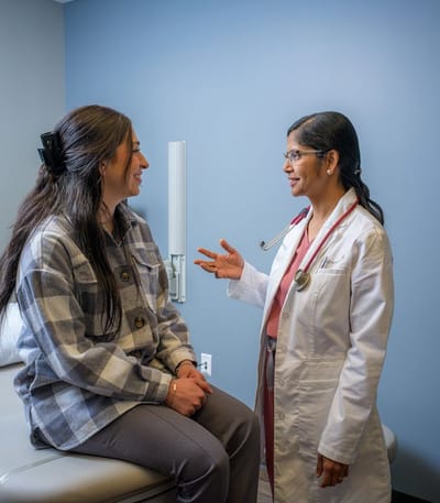 Doctor consulting with a patient in an office.