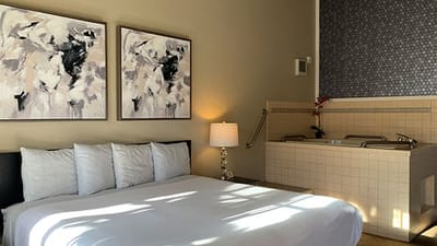 Cozy interior of a resident's room with artwork.