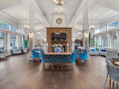 Bright common area with elegant seating and decor