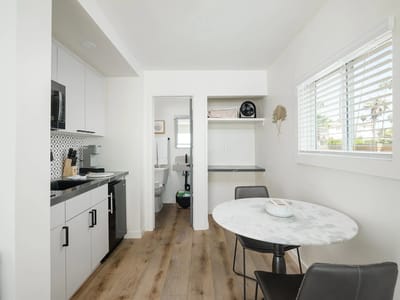 Modern kitchen and dining area with a table