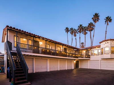 Exterior view of Marbella Anaheim with palm trees