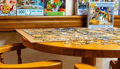 Puzzle and table in a cozy interior setting