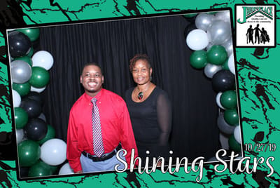 Two individuals posing at an event