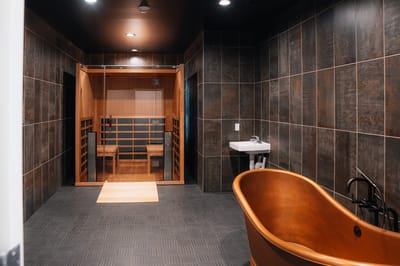 Interior of a wellness retreat sauna and bathing area.