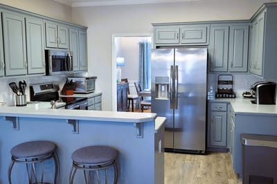 Modern kitchen with appliances and dining area