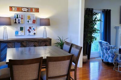 Interior game room with a dining table and decor
