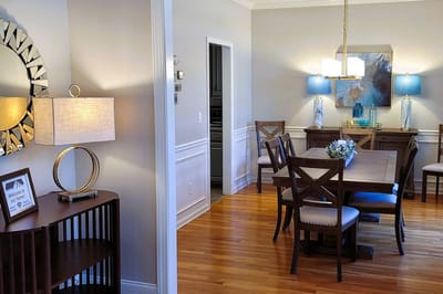 Bright dining area with wooden table and chairs