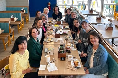 Group of women enjoying a meal together