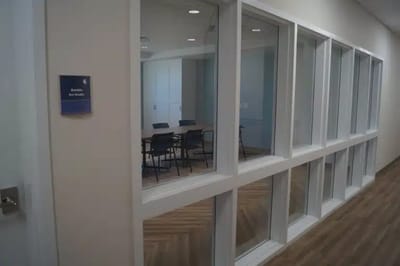 Interior view of a meeting room with glass panels