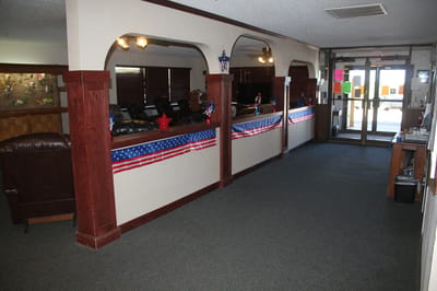 Interior corridor with patriotic decorations and seating
