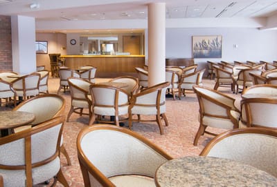 Common area with chairs and tables.