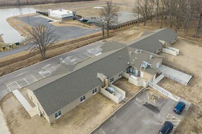 Aerial view of Harborside Senior Living facility and surrounding area.