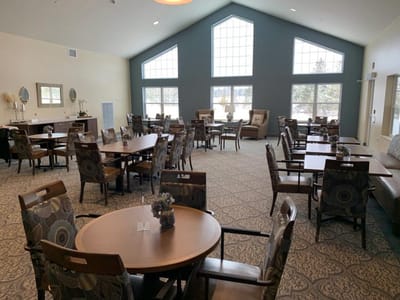 Bright dining area with tables and chairs