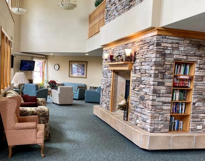Cozy common area with seating and fireplace.