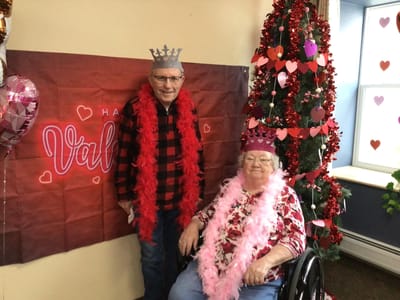 Residents celebrating Valentine's Day with decorations.