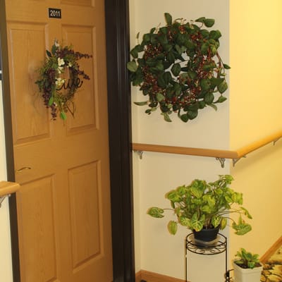 Front door with a decorative wreath